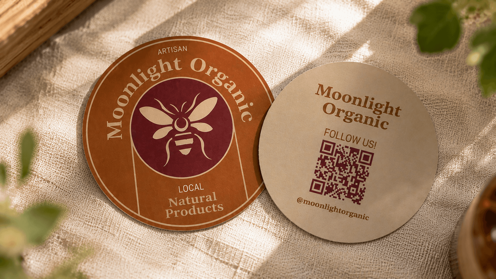 Moonlight Organic backprinted stickers featuring branded artwork on the front and a QR code on the backing.