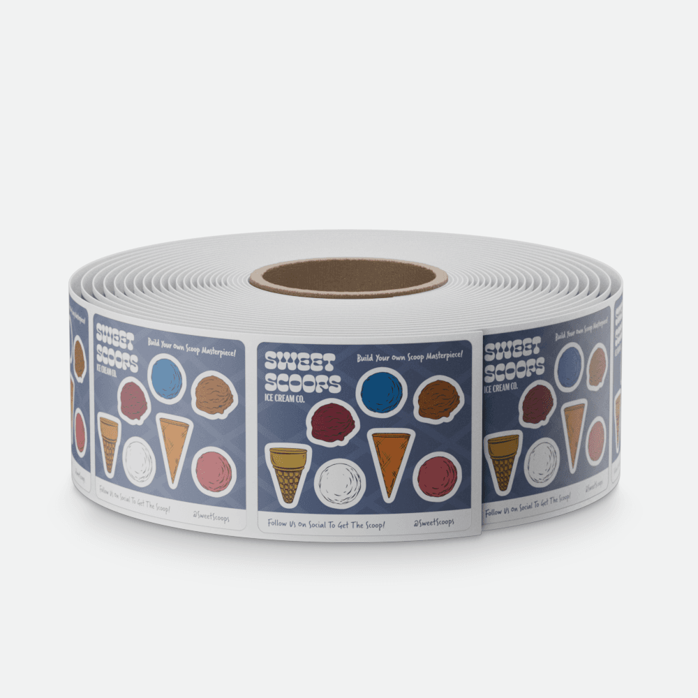 A roll of blue product labels featuring colorful frozen treat illustrations is displayed on a light gray background.
