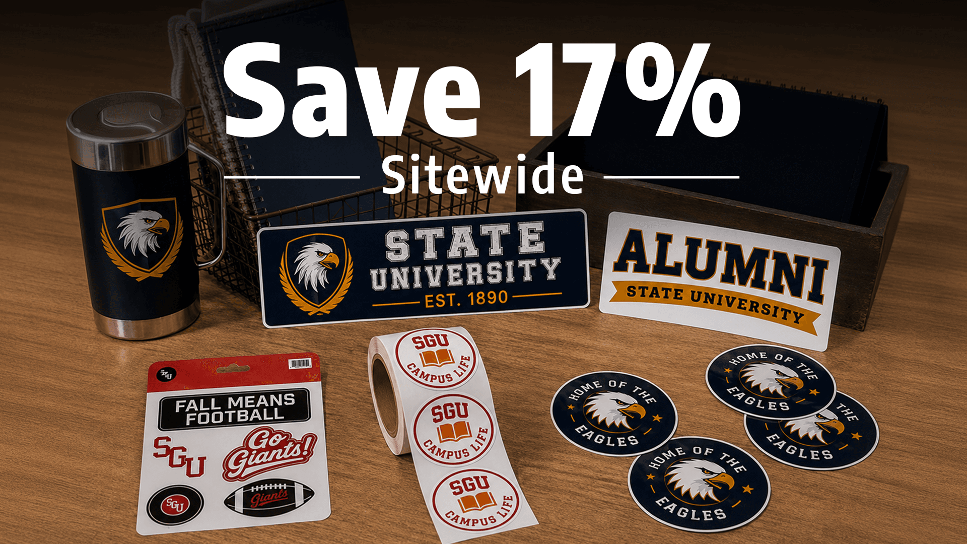 Save 17% sitewide promotion featuring university-themed custom stickers and labels on a tumbler, notebooks, sticker sheet, and sticker roll.