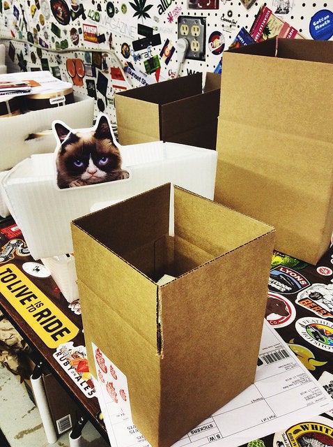 Grumpy-Cat-custom-shaped-sticker-in-shipping-boxes-at-the-StickerGiant-factory