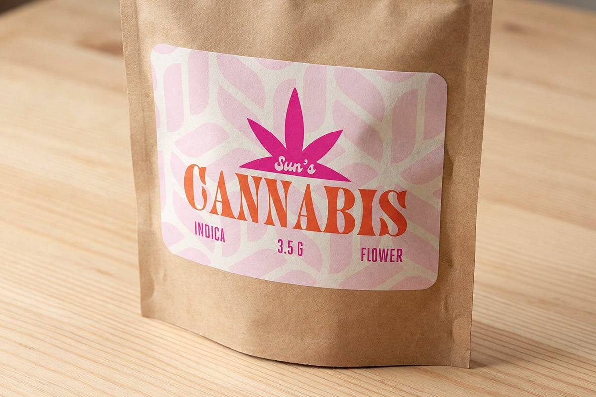 Cannabis flower pouch packaging with custom product label.