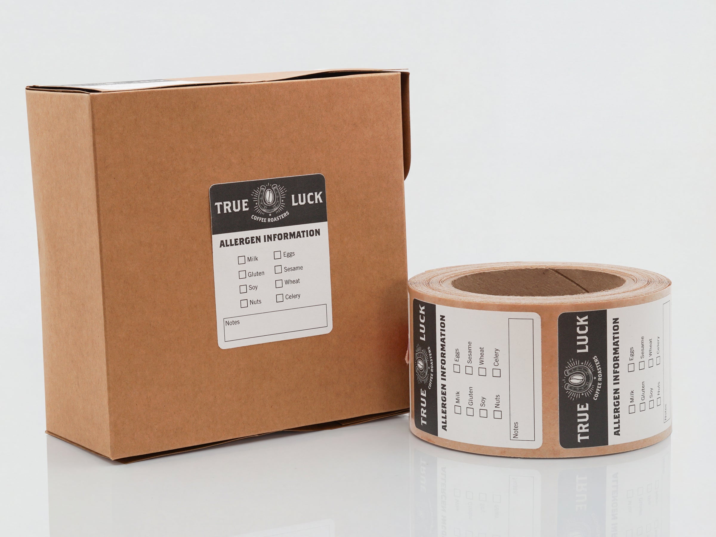 Coffee packaging labels on roll applied to coffee bag product packaging.
