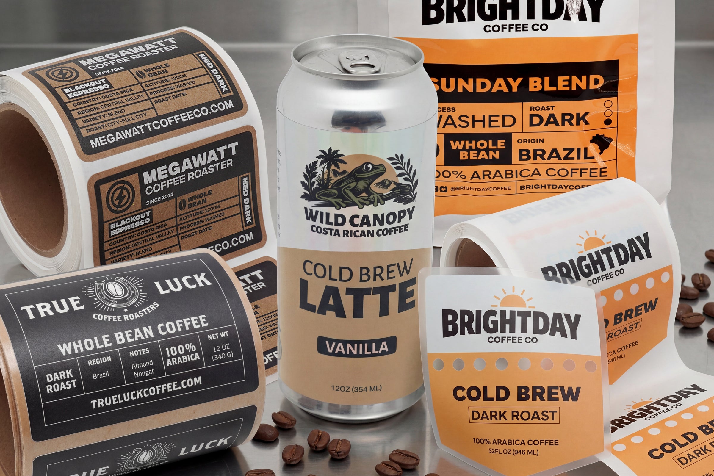 Coffee packaging with custom product labels including cold brew cans, coffee bags, and label rolls.