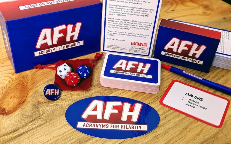 Acronyms for Hilarity game components displayed with an AFH Oval Sticker.
