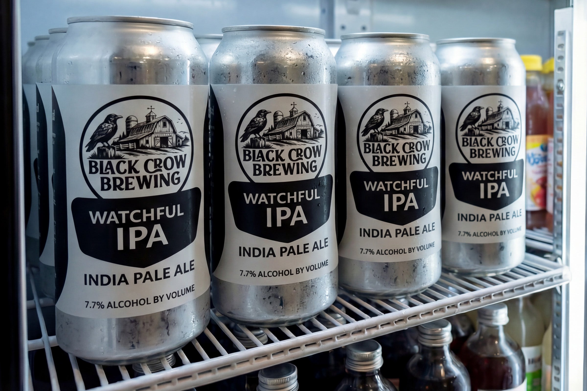 Beer cans with custom water resistant labels stored in a refrigerated display case.
