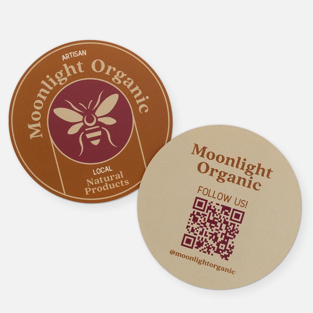 Round backprinted sticker with organic bee logo and QR code for Moonlight Organic.
