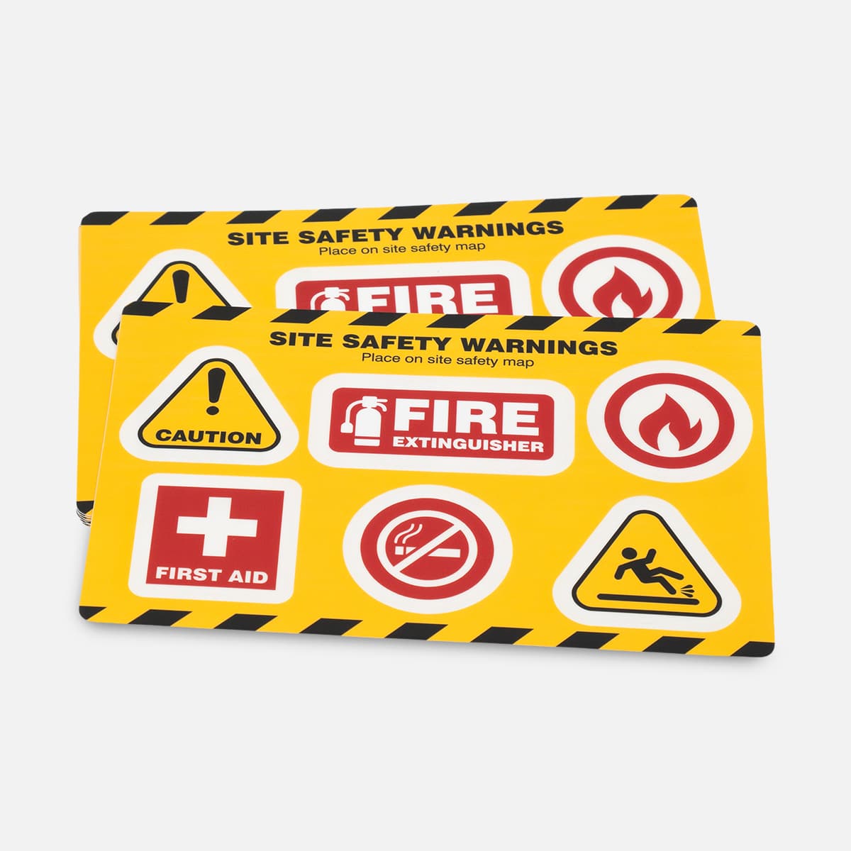 Stack of custom rectangle site safety warning stickers with caution, fire extinguisher, first aid, and safety icon graphics on a yellow background.